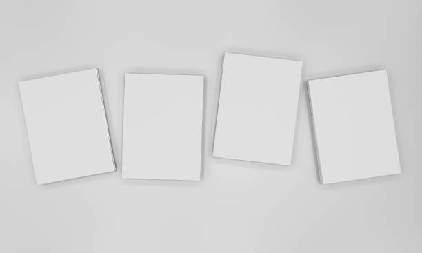 Row of piled white catalogs