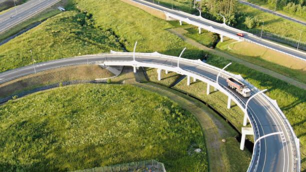 istock turning circle with driving lane lit by morning sunlight 1172791006