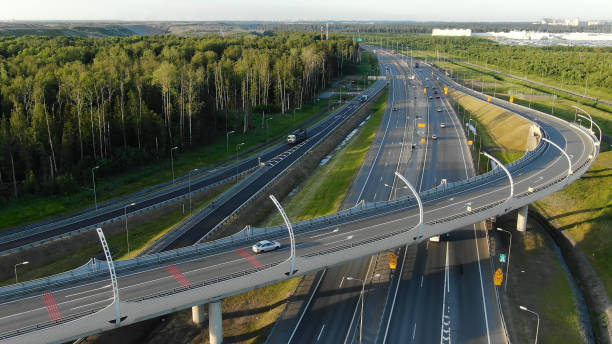 istock transport interchange with different roads and white marking 1172791046