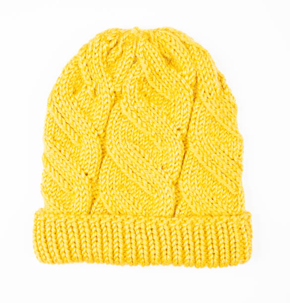 istock Yellow woolen cap isolated on white background 1172793710