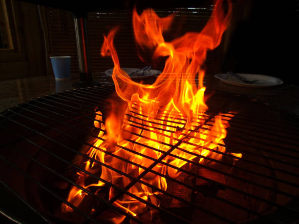 istock Ready to start grilling, flames in close-up picture 1172795180