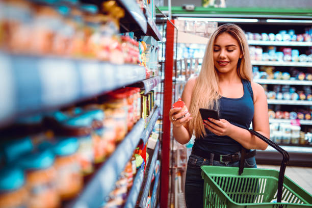 istock Cute Female Counting Product Calories 1172796477
