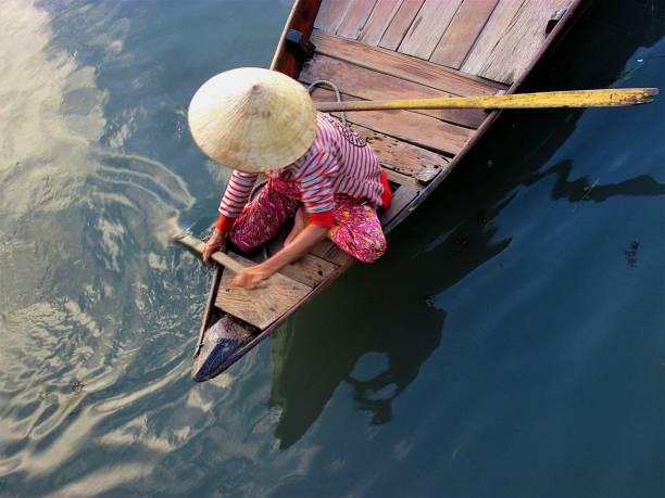 Vietnamese woman on the boat