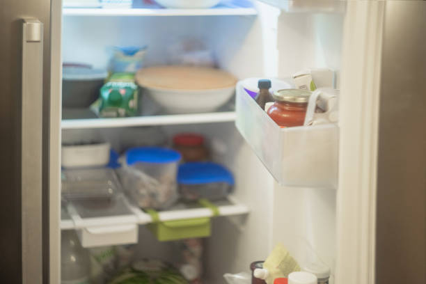 istock open refrigerator door, blurry background products 1172798865
