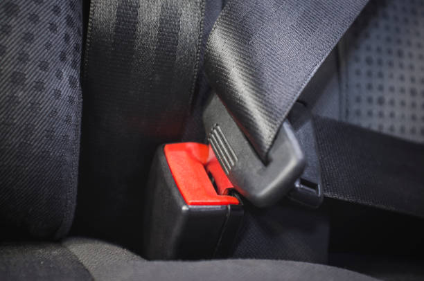 istock car seat belt buckle, close up 1172798868