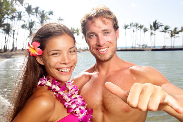 istock Hawaii couple happy on Hawaiian beach 1172799020