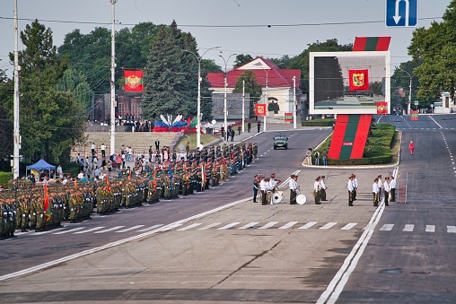 Tiraspol, Transnistria - September 02, 2019: White fanfare and military forces parading at The Independence day celebration in Tiraspol, Transnistria.