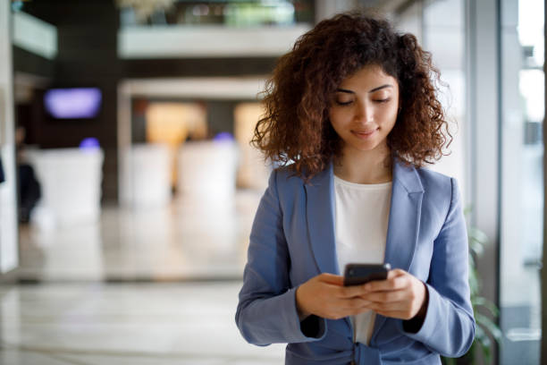 istock Young businesswoman using mobile phone 1172801899