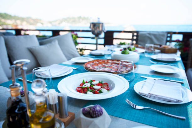 istock Dinner tables near the sea 1172821020