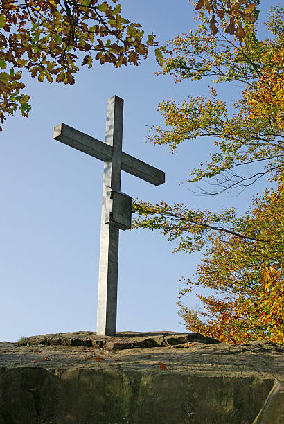 istock Cross on the summit  in autumn 117282663