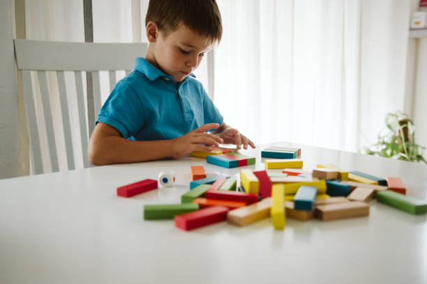 Cute little boy having fun at home.