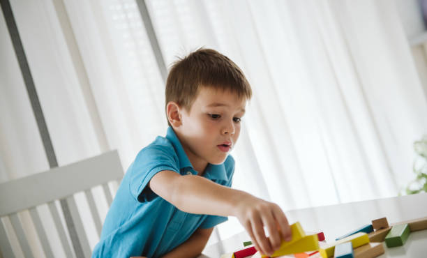 istock Cute little boy having fun at home. 1172829052