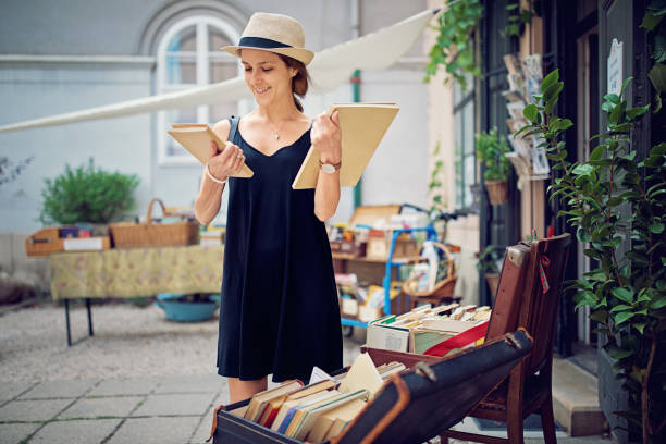 istock Woman is choosing books in a bookstore 1172829267