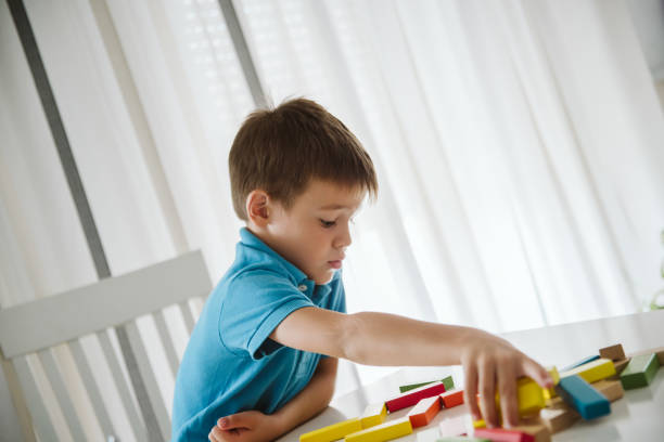 istock Cute little boy having fun at home. 1172829535