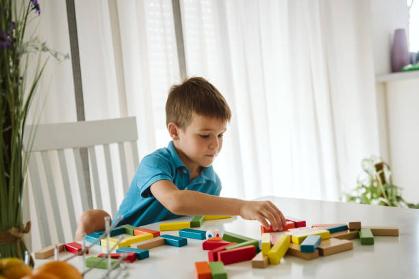 istock Cute little boy having fun at home. 1172830275