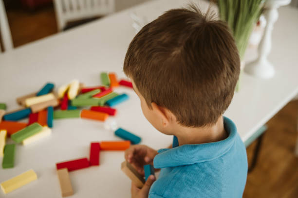 istock Cute little boy having fun at home. 1172830402