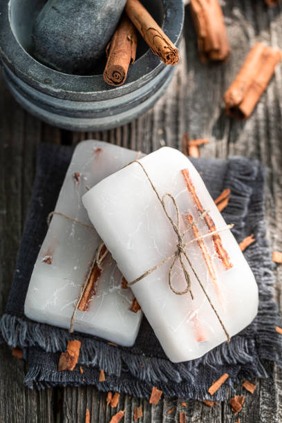 istock Aromatic cinnamon soap on old wooden table 1172833881