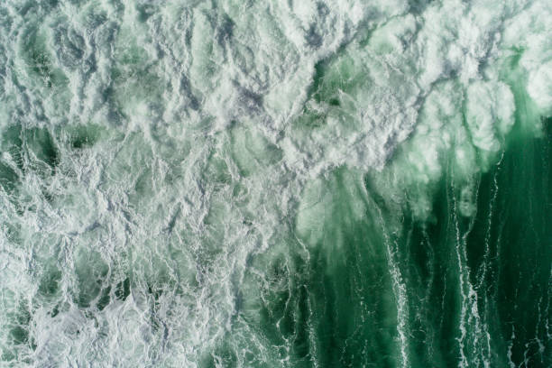 Sea waves nature power. Aerial view of sea waves splashing. green building photos stock pictures, royalty-free photos & images