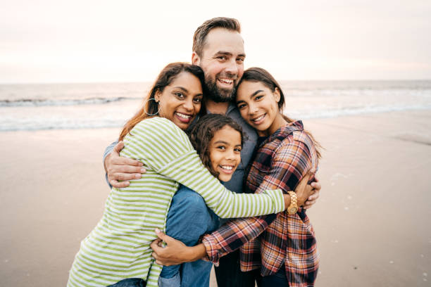 Big family hug Two parents two kids 40 44 years photos stock pictures, royalty-free photos & images