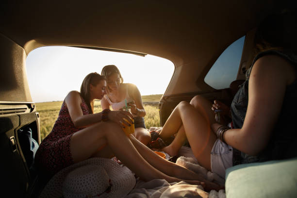 istock Relaxing on a camping trip while looking at mobile phone 1172836829