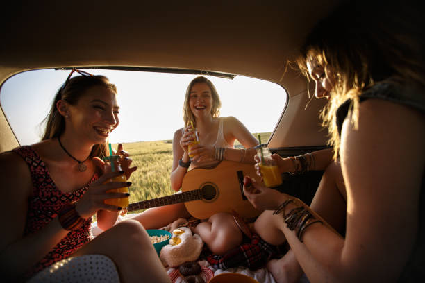 istock Three young females having fun on a camping trip 1172836830