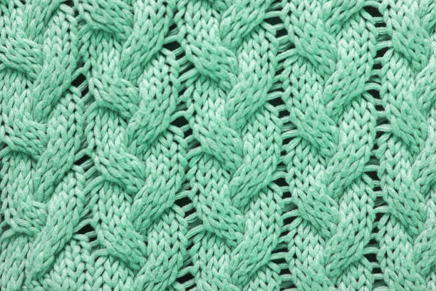 istock Trendy neo mint tissue clothes texture. Close up of sweater pattern 1172840101
