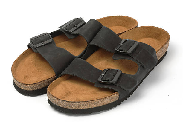 istock Black cork sandals, isolated on white background 117285017