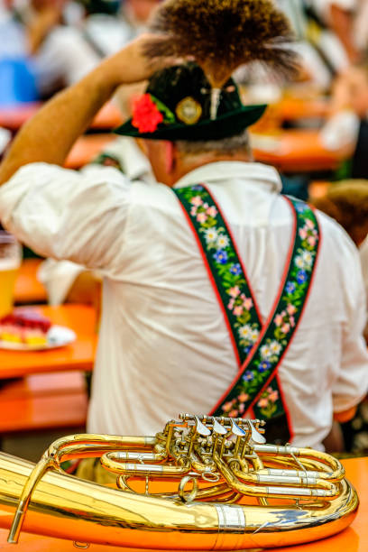 bavarian musician typical bavarian musician in a festival tent dirndl traditional clothing austria traditional culture stock pictures, royalty-free photos & images