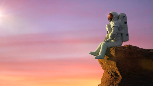 astronaut on planet Mars, sitting on a cliff  (3d space rendering)