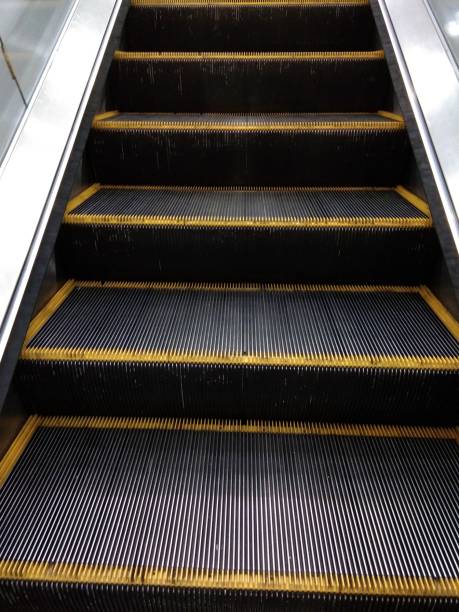 istock escalator floor texture with black yellow stripes 1172858130