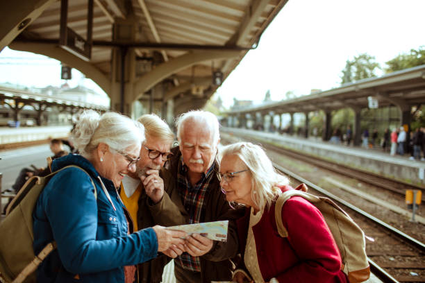 istock Seniors at a Train station 1172864780