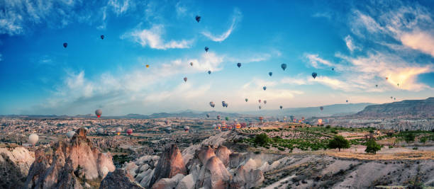 istock Balloons in the cloudy sky over Cappadocia 1172865530
