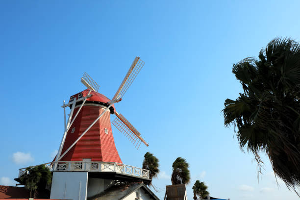 istock close up red wooden windmill over sunny blue sky 1172867912