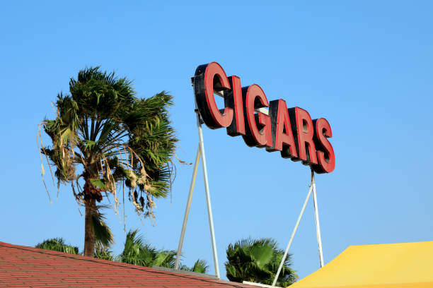 istock cigars sign on roadside over blue sky 1172867980