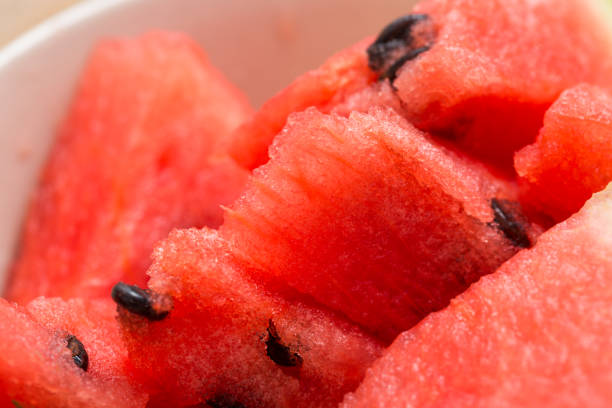 istock Watermelon slice closeup in a bowl 1172879624