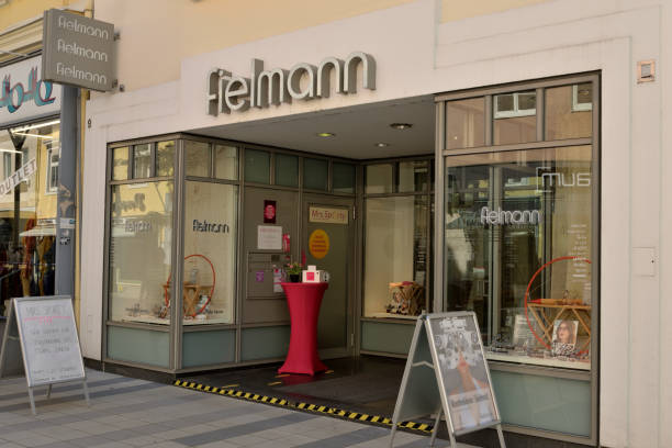 shop for eyewear of the retail chain "fielmann" Wiener Neustadt, Austria - September 5, 2019: Front and entrance to a shop for eyewear of the retail chain "fielmann" in the pedestrian area of Wiener Neustadt wiener neustadt stock pictures, royalty-free photos & images