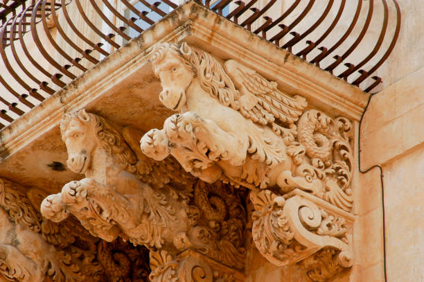 Sicily Noto Baroque Balcony An example of Sicilian Baroque style. noto sicily stock pictures, royalty-free photos & images