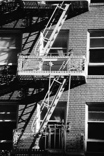 Image of a fire escape on a city building in downtown San Francisco, California.  This image is a high resolution film scan from a 35mm negative.  