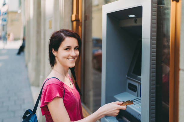 istock Tourist using credit card on the ATM 1172884776