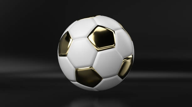 istock golden soccer ball on black background, 3d render. 1172885713
