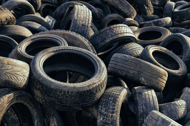 istock Old tyre recycling background. Tire trash texture. 1172887062