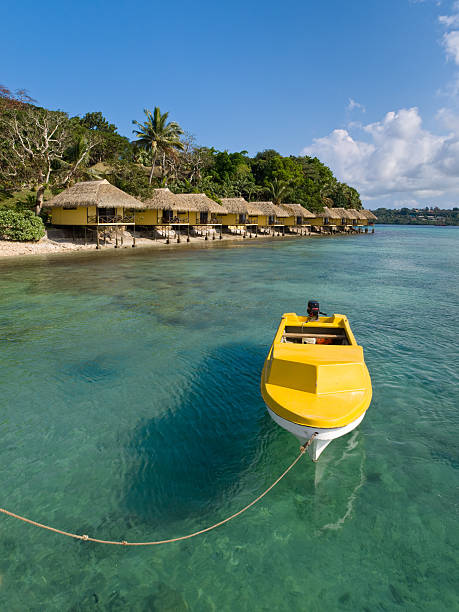 amarillo barco en isla de efate - pacific ocean tourist resort day reflection fotografías e imágenes de stock