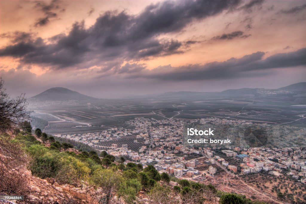 Mount tabor ,Israel Mount Tabor is located in Lower Galilee, at the eastern end of the Jezreel Valley. It is believed by many to be the site of the Transfiguration of Christ and site for the battle between Barak and the army of Jabin, commanded by Sisera. It is also known as Har Tavor, Itabyrium, Jebel et-Tur, and the Mount of Transfiguration. WIKIPEDIA. Galilee Stock Photo