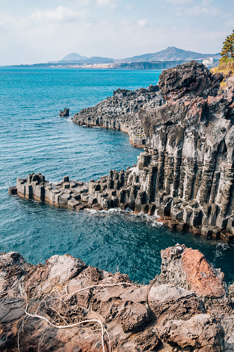 Daepo Jusangjeolli Cliff Columnar Joints and sea in Jeju Island, Korea