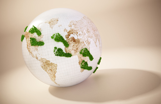 Green footprints on the globe. Copy space on the right.\nAdobe Illustrator and Photoshop used for world texture map modifications. Original texture link: https://eoimages.gsfc.nasa.gov/images/imagerecords/73000/73580/world.topo.bathy.200401.3x5400x2700.jpg