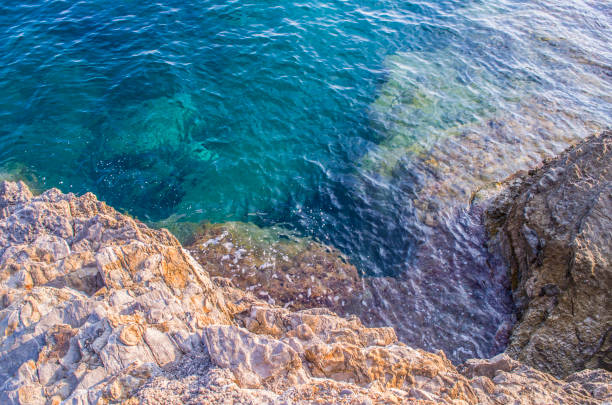istock Water surface and rocks stones on sea floor 1172899520