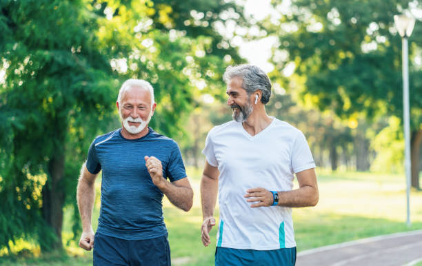istock Senior friends jogging 1172899812