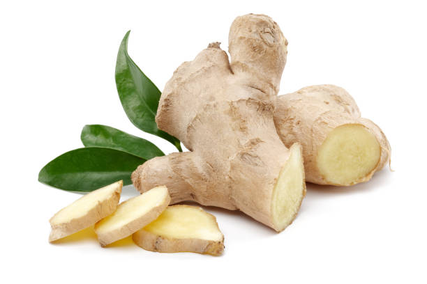 istock Fresh ginger root with slices and leaves isolated 1172904922