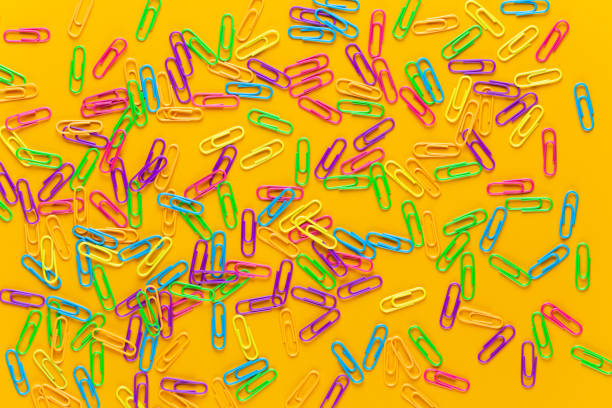istock Paper color clip notebook on yellow background. Flat lay. 1172905462