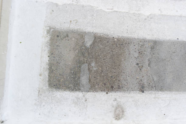 istock concrete exterior floor with parts painted in white 1172906279